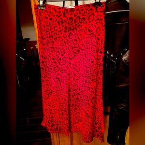Socialite Bright red and black leopard print skirt with slit NWT